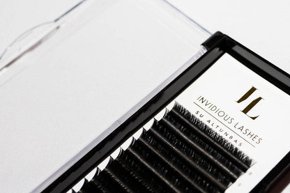 Tray of Classic Eyelash Extensions in Mixed Lengths from 8-15mm, D Curl, 0.15mm thickness, offering a variety of individual lashes for creating dramatic, voluminous lash looks with a strong curl.