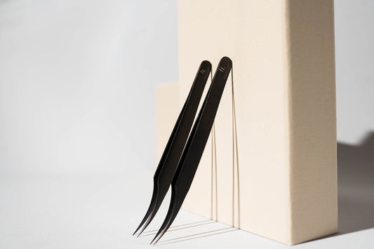 Eyelash Extension Isolation Tweezers with Ruler, featuring precision tips and measurement markings, designed for accurate and efficient isolation of individual lashes during extension application.