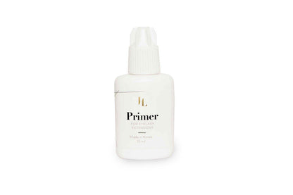 Bottle of Eyelash Extension Primer, designed to cleanse and prepare natural lashes for extension application, ensuring better adhesive bonding and longer-lasting results.